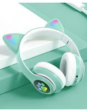 Brandtrendy Audífonos Auriculares Bluetooth inalámbricos con Forma de Orejas de Gato Plegables y portátiles con Control de Volumen y luz LED Conexión Estable y Sonido Claro para niños y niñas (Verde)